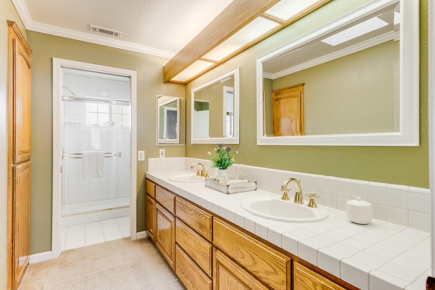 757 Harry Road San Jose, CA 95120 - Photo 44 of 60 a bathroom with a granite countertop sink and a mirror