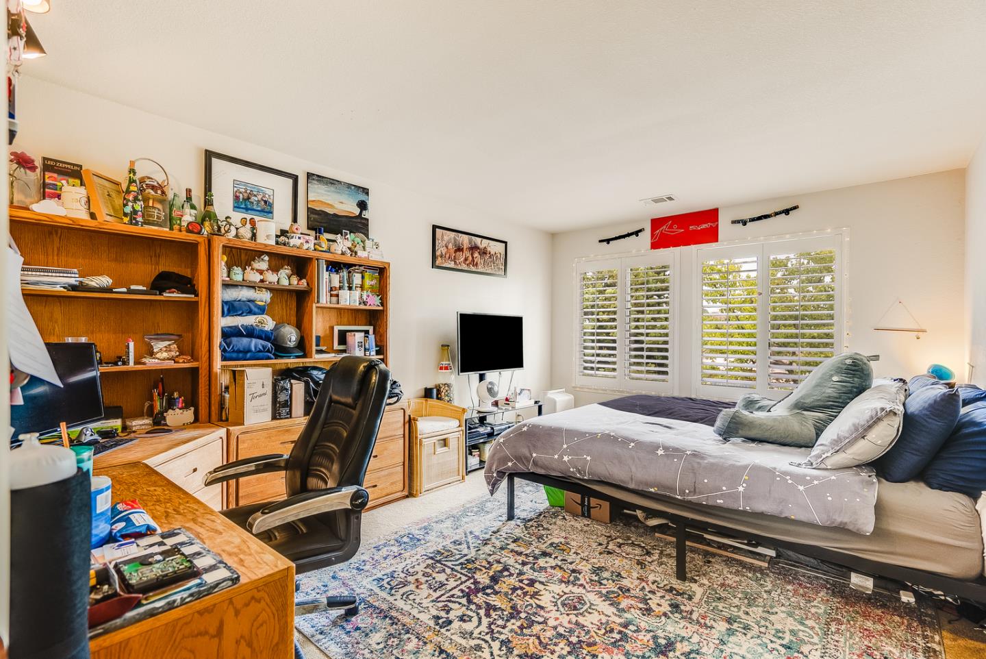 757 Harry Road San Jose, CA 95120 - Photo 46 of 60 a living room with furniture and a flat screen tv