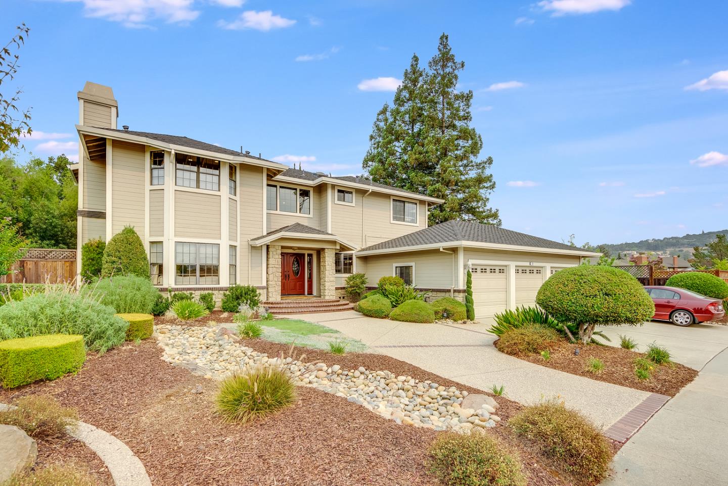 757 Harry Road San Jose, CA 95120 - Photo 49 of 60 a front view of a house with a yard and potted plants