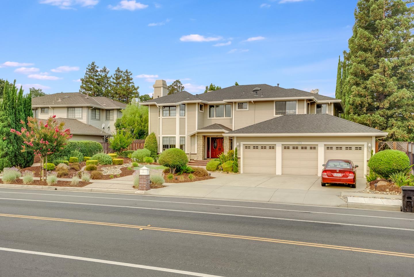 757 Harry Road San Jose, CA 95120 - Photo 53 of 60 a front view of a house with a garden and plants