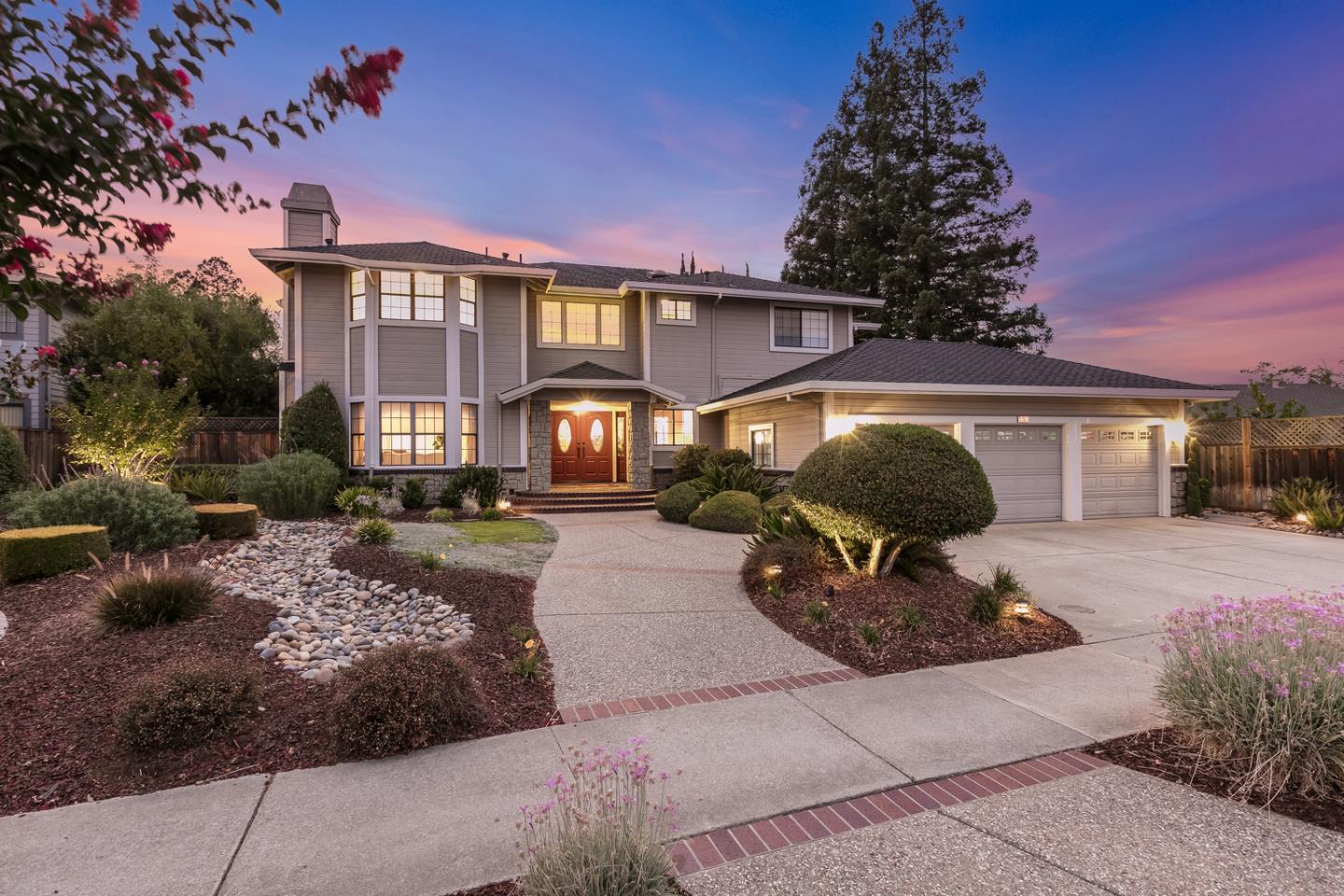 757 Harry Road San Jose, CA 95120 - Photo 55 of 60 a front view of a house with garden and patio