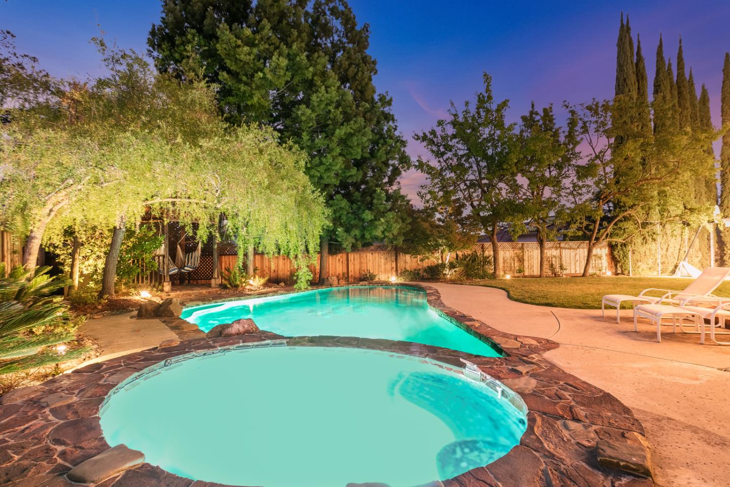 757 Harry Road San Jose, CA 95120 - Photo 9 of 60 a view of a swimming pool with an outdoor space and seating area