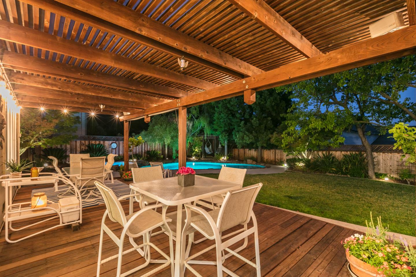 757 Harry Road San Jose, CA 95120 - Photo 10 of 60 a view of a patio with table and chairs and garden view
