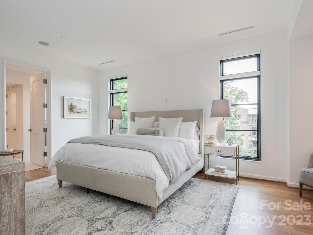 1333 Queens Road, Unit C3 Charlotte, NC 28207 - Photo 10 of 15 a bedroom with a bed and a window