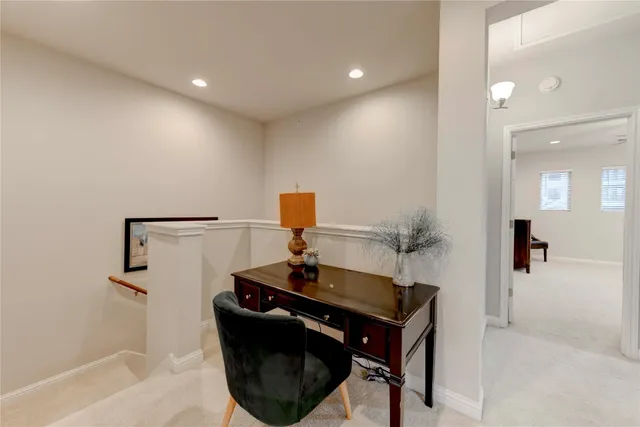 a room with a sink and a mirror