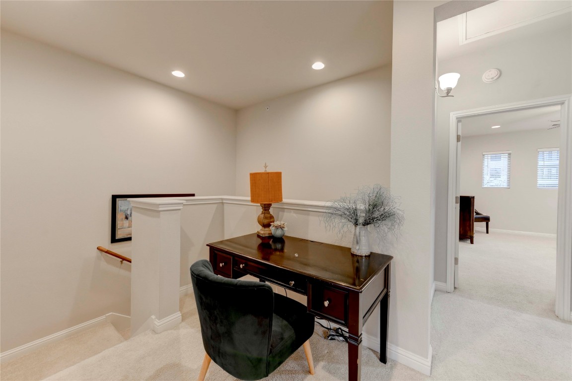 13800 Lyndhurst Street, Unit 125 Austin, TX 78717 - Photo 20 of 27 a room with a sink and a mirror