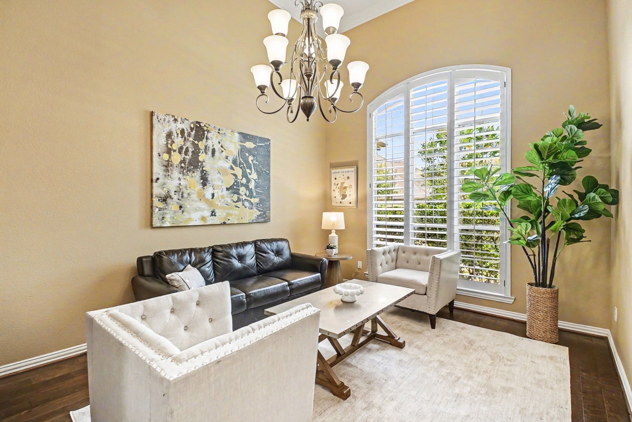 8210 Thunder Ridge Way Missouri City, TX 77459 - Photo 6 of 42 This versatile room offers elegance and flexibility, ideal as a formal living or dining area. The central chandelier is perfect for illuminating a large dining table.