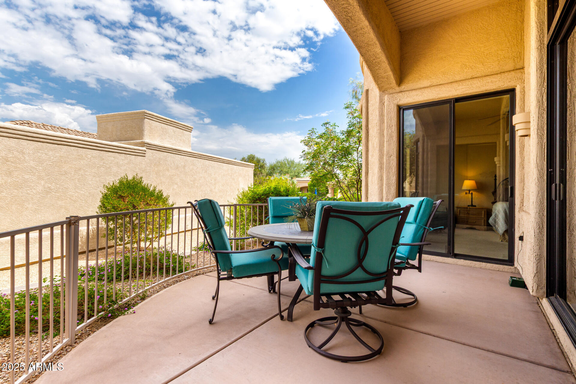 25621 North Sago Drive Rio Verde, AZ 85263 - Photo 24 of 45 a view of a chair and table in the balcony