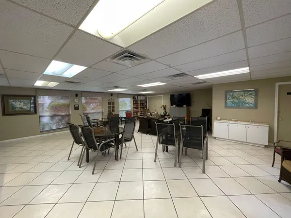 a group of people sitting in a room