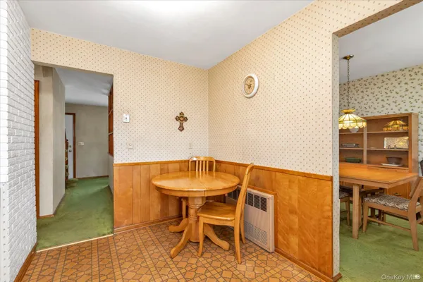 a view of a room with table and chair