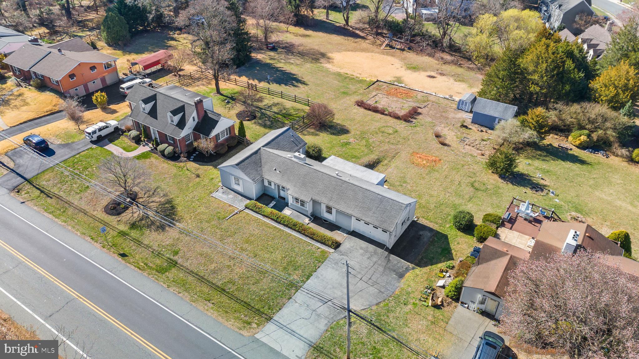 1005 Nottingham Road Newark, DE 19711 - Photo 41 of 47 an aerial view of a house with a swimming pool