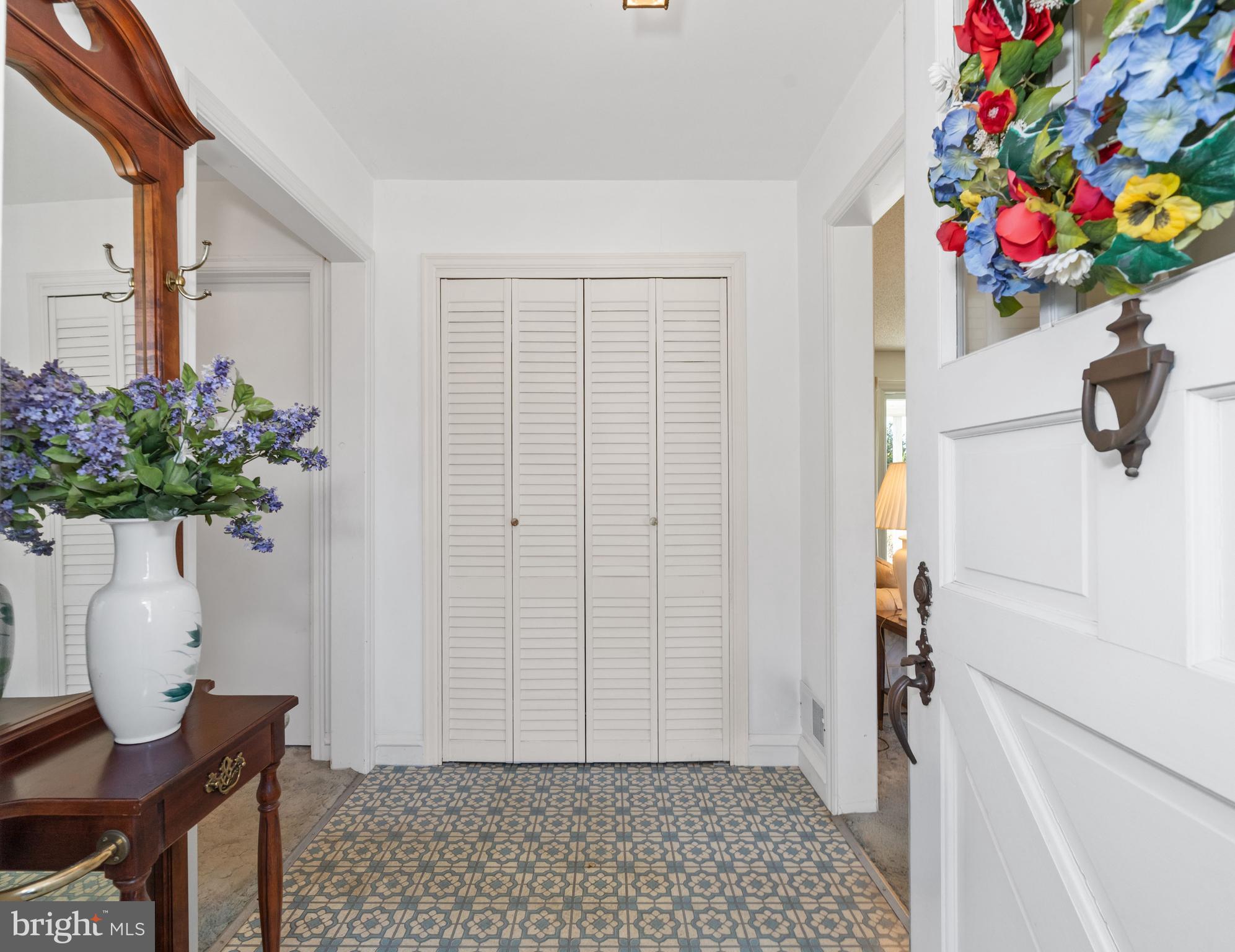 1005 Nottingham Road Newark, DE 19711 - Photo 6 of 47 a view of entryway with flowers