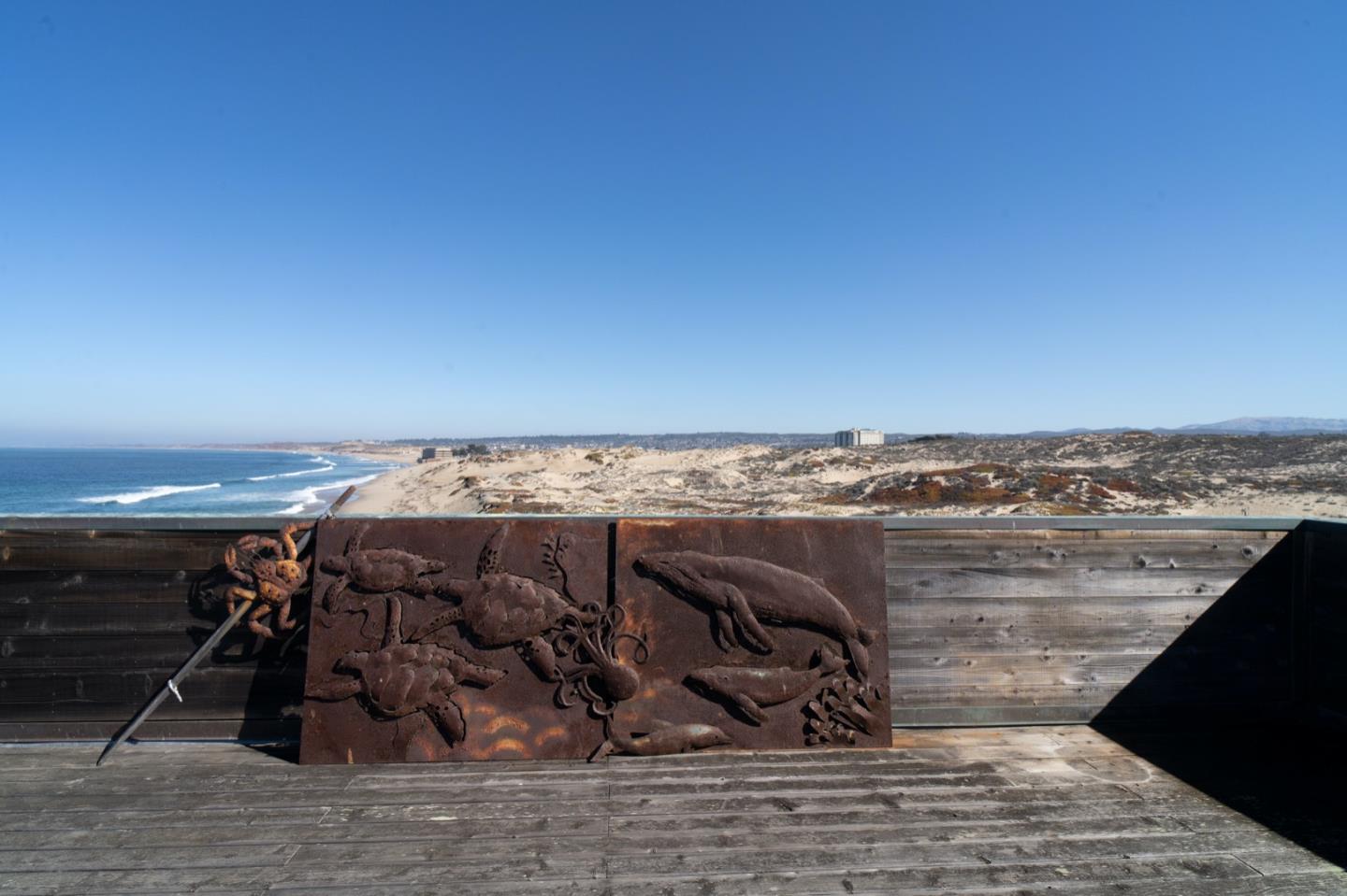 1 Surf Way, Unit 240 Monterey, CA 93940 - Photo 18 of 29 a view of a sky from a balcony