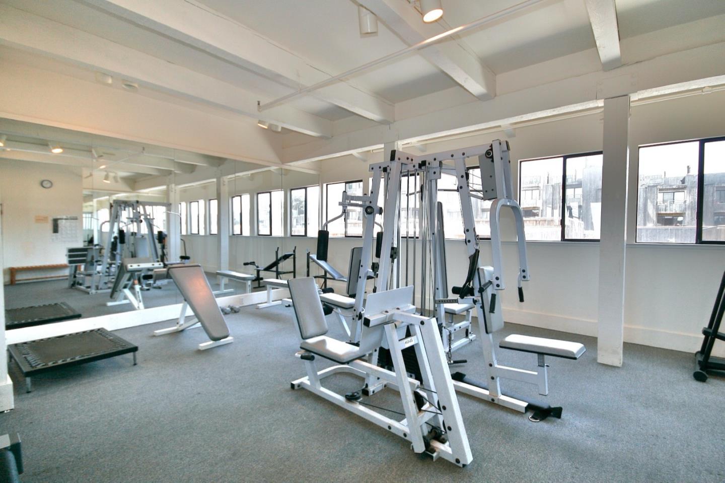1 Surf Way, Unit 240 Monterey, CA 93940 - Photo 25 of 29 a view of a room with gym equipment