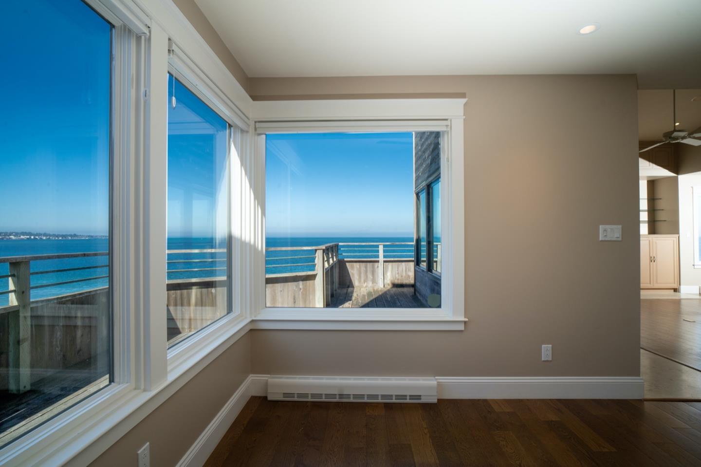 1 Surf Way, Unit 240 Monterey, CA 93940 - Photo 7 of 29 a view of an empty room with a window
