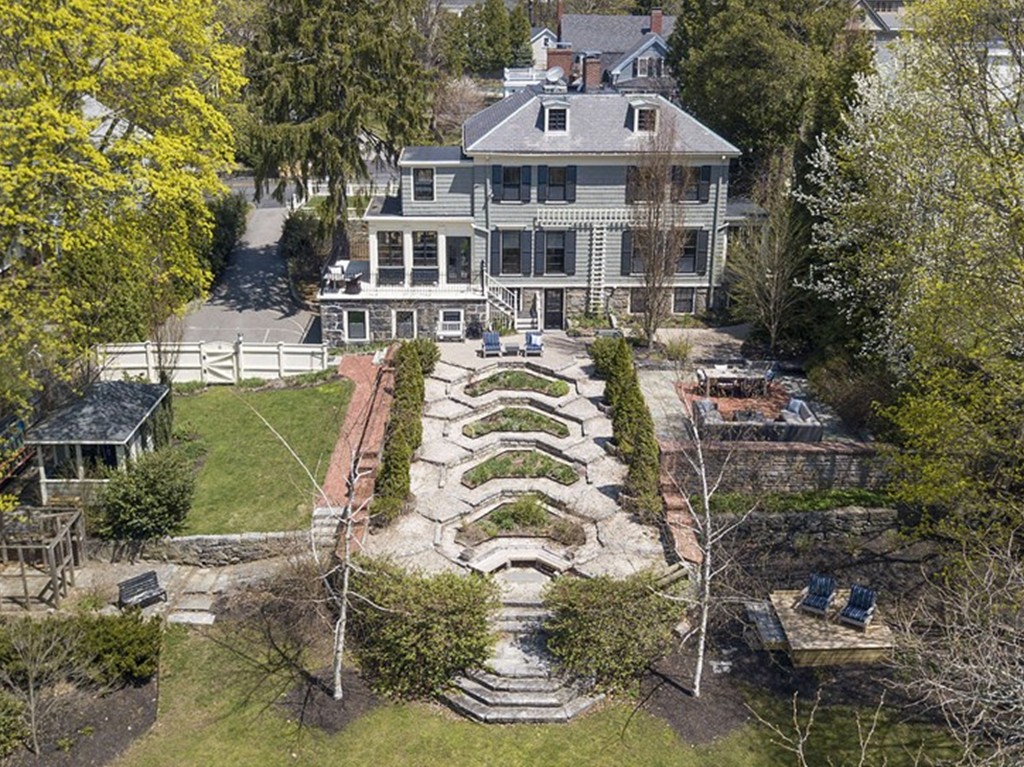173 School Street Milton, MA 02186 - Photo 1 of 30 a front view of a house with a garden
