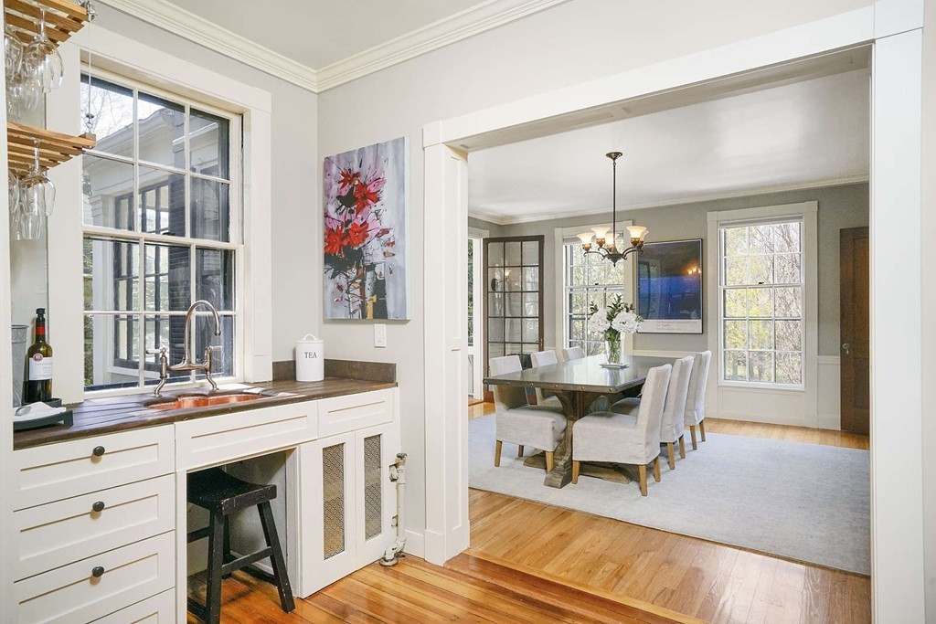 173 School Street Milton, MA 02186 - Photo 12 of 30 a view of a dining room with furniture window and wooden floor