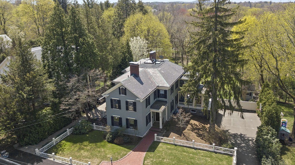 173 School Street Milton, MA 02186 - Photo 30 of 30 an aerial view of a house with a yard swimming pool and green space