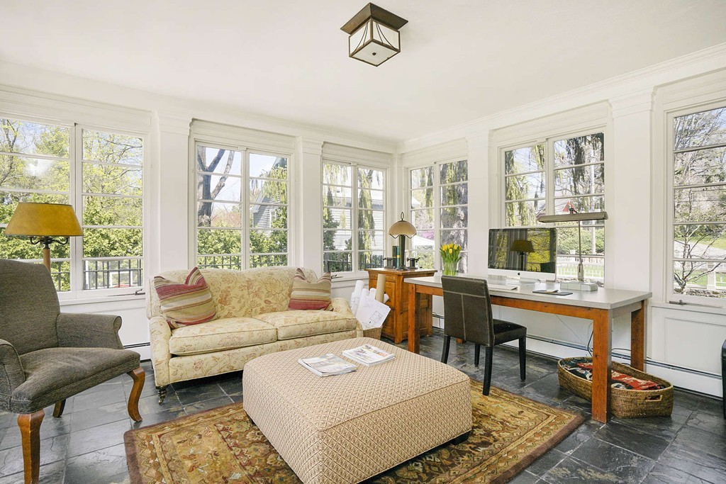 173 School Street Milton, MA 02186 - Photo 7 of 30 a living room with furniture and a large window