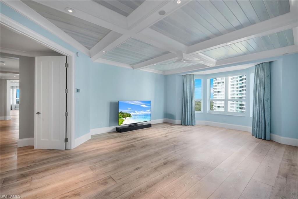 285 Grande Way, Unit 1006 Naples, FL 34110 - Photo 28 of 46 a view of an empty room with a window