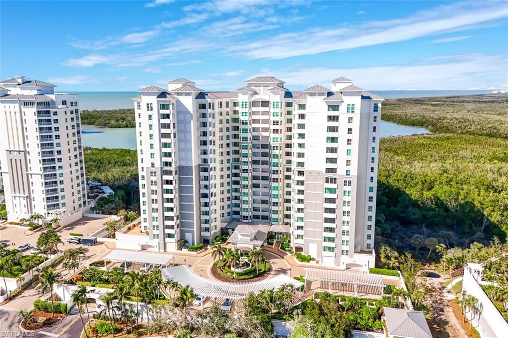 285 Grande Way, Unit 1006 Naples, FL 34110 - Photo 33 of 46 a view of a city with tall buildings