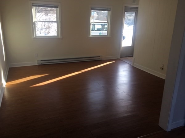 4 Providence Road Sutton, MA 01590 - Photo 11 of 14 a view of room with window and fireplace