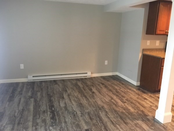 4 Providence Road Sutton, MA 01590 - Photo 9 of 14 a view of a room with wooden floor
