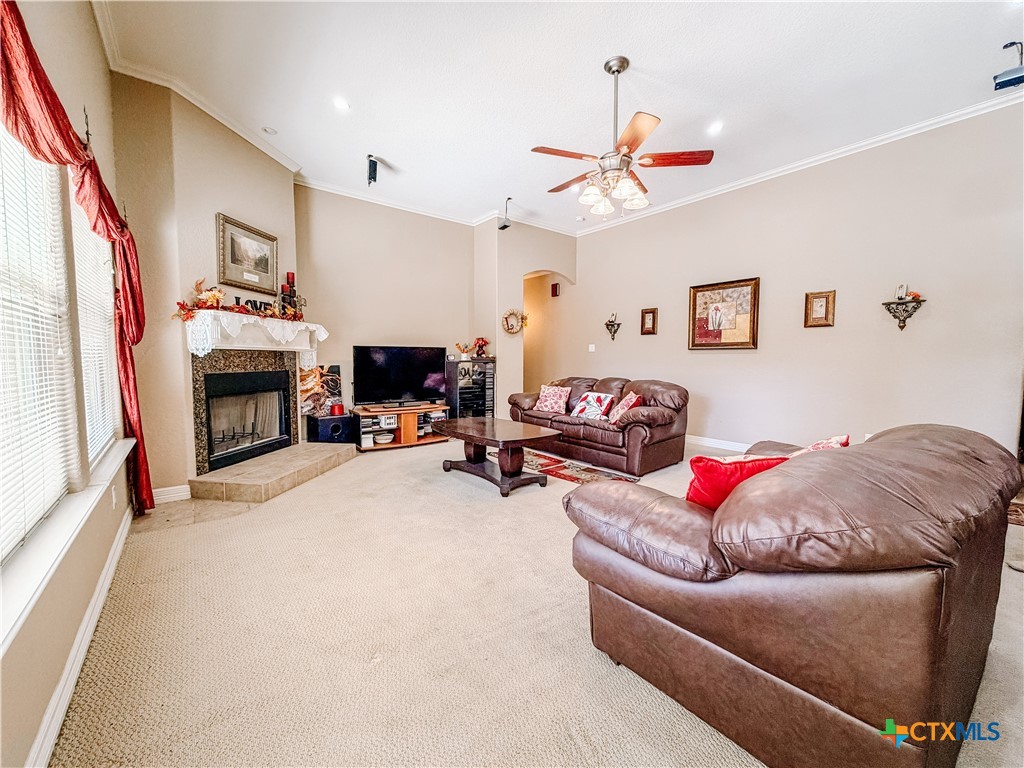 1027 Stagecoach Trail San Marcos, TX 78666 - Photo 14 of 36 a living room with furniture and a fireplace
