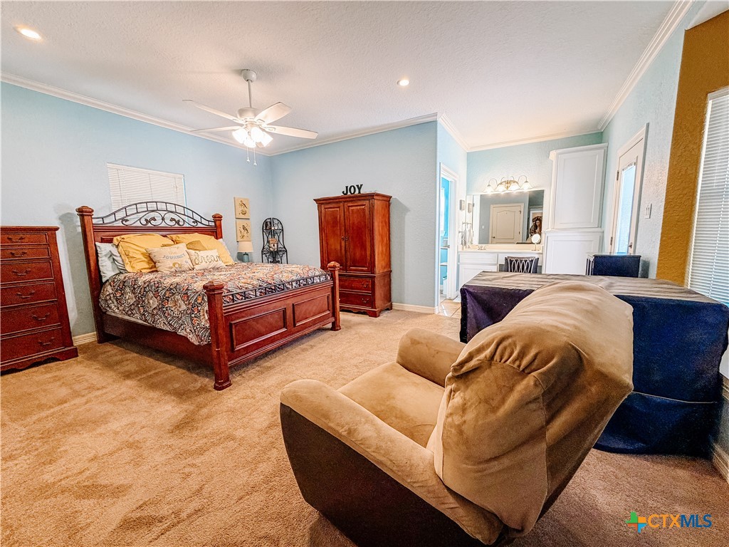 1027 Stagecoach Trail San Marcos, TX 78666 - Photo 24 of 36 a bedroom with bed and window