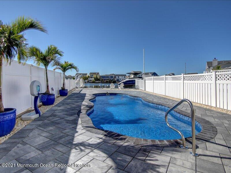 401 8th Avenue Seaside Heights, NJ 08751 - Photo 2 of 45 a room with furniture and a potted plant