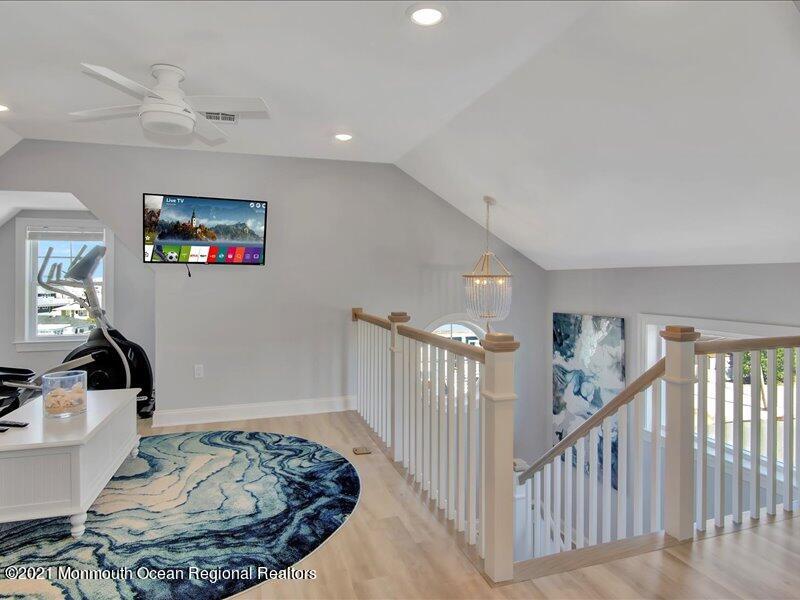 401 8th Avenue Seaside Heights, NJ 08751 - Photo 22 of 45 a view of a livingroom with furniture and staircase