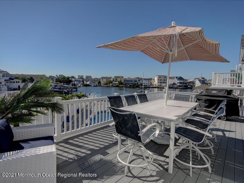 401 8th Avenue Seaside Heights, NJ 08751 - Photo 29 of 45 a terrace with outdoor seating and city view