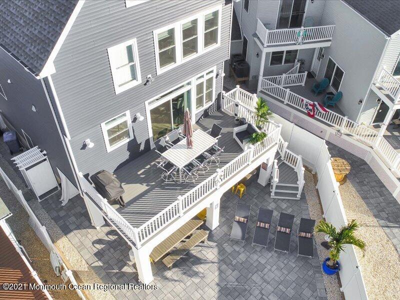 401 8th Avenue Seaside Heights, NJ 08751 - Photo 40 of 45 a view of a patio with table and chairs