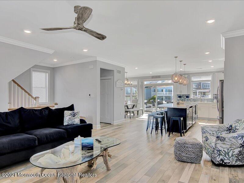 401 8th Avenue Seaside Heights, NJ 08751 - Photo 45 of 45 a living room with furniture kitchen view and a dining table