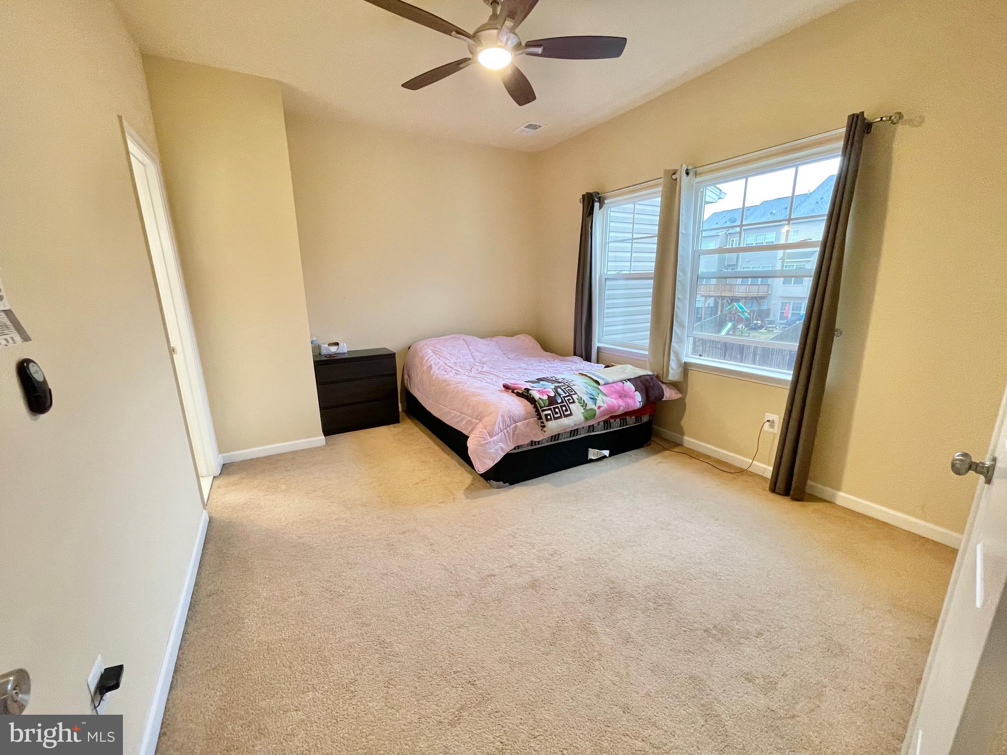 155 Short Branch Road Stafford, VA 22556 - Photo 17 of 32 a room with a bed and a window