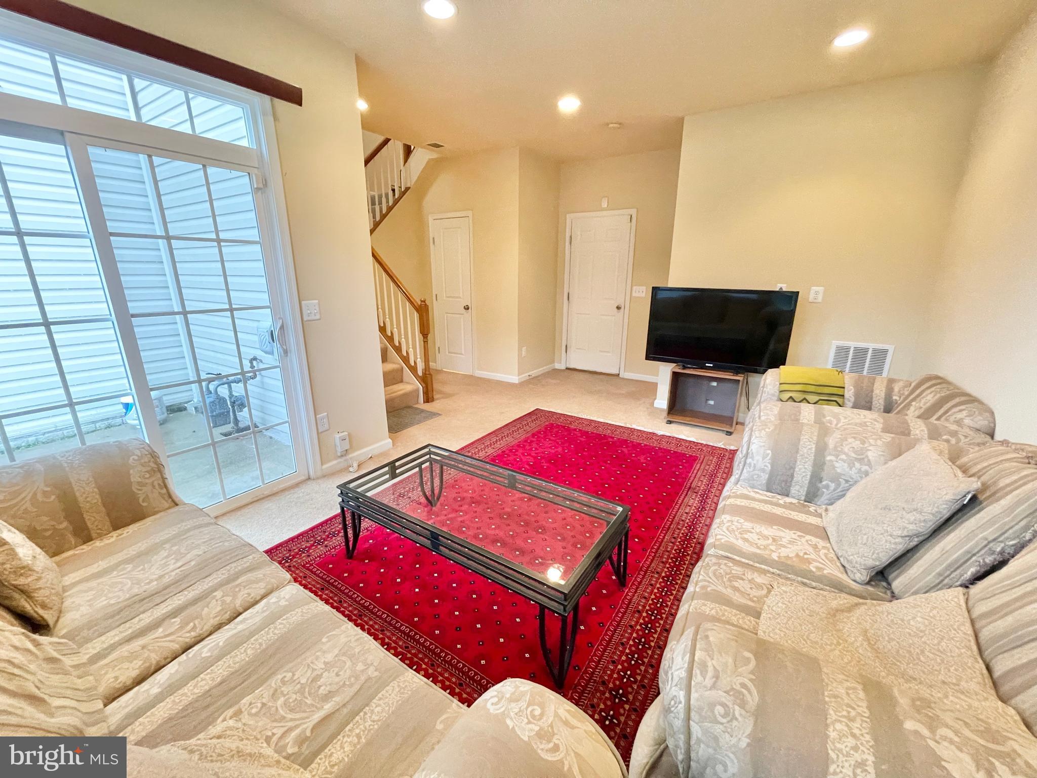 155 Short Branch Road Stafford, VA 22556 - Photo 28 of 32 a bedroom with a bed and a flat screen tv