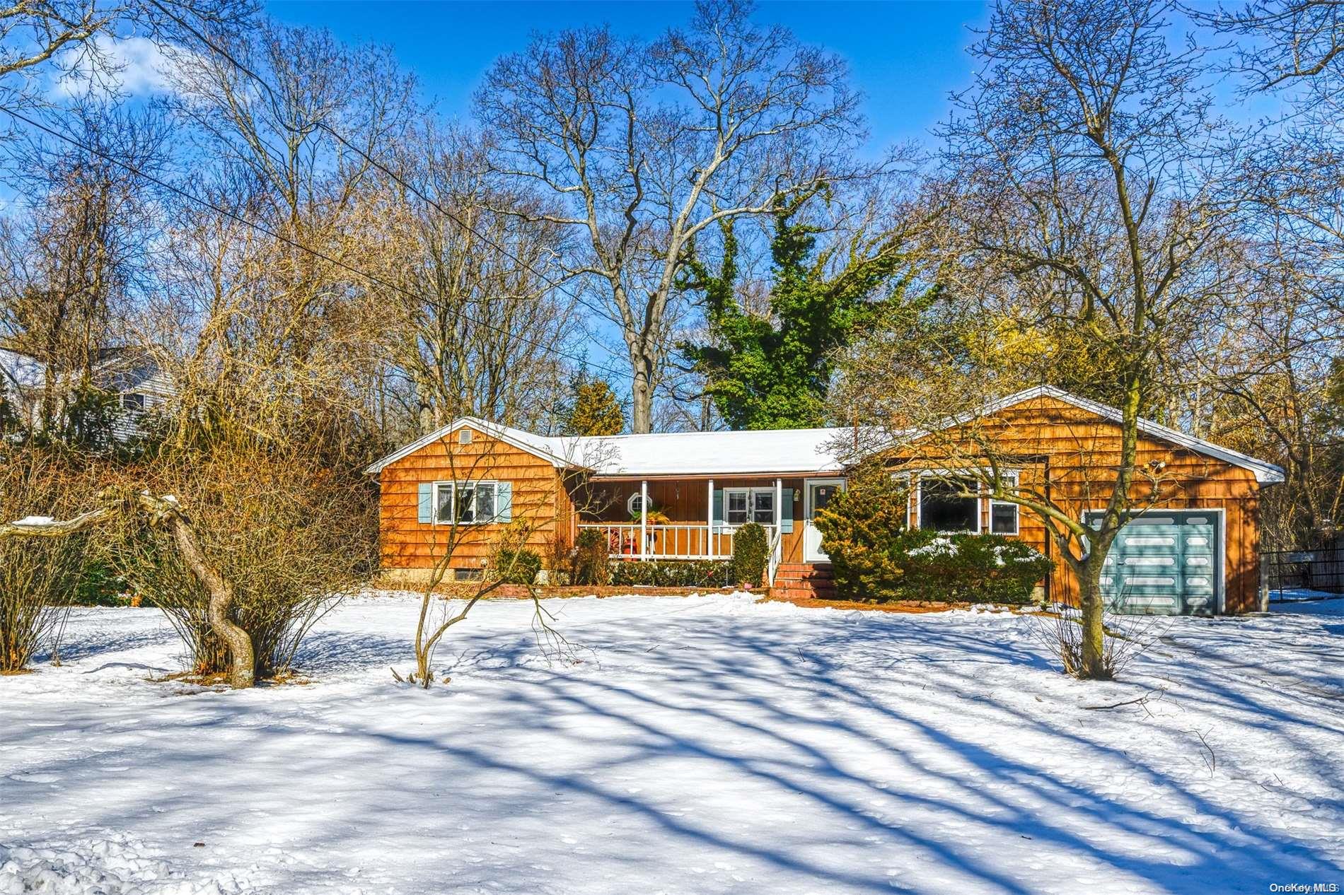 24 Loft Road Smithtown, NY 11787 - Photo 1 of 1 a front view of a house with a yard