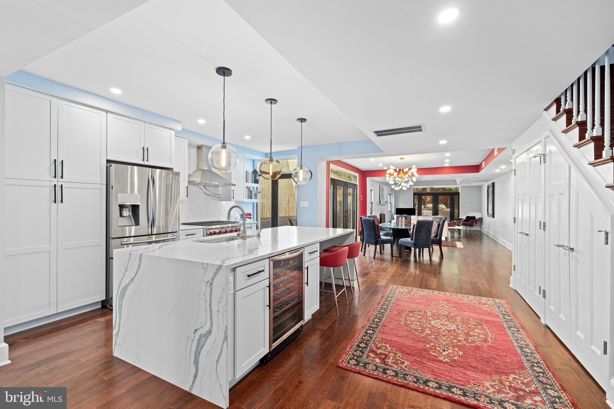 a view of a kitchen and dining room