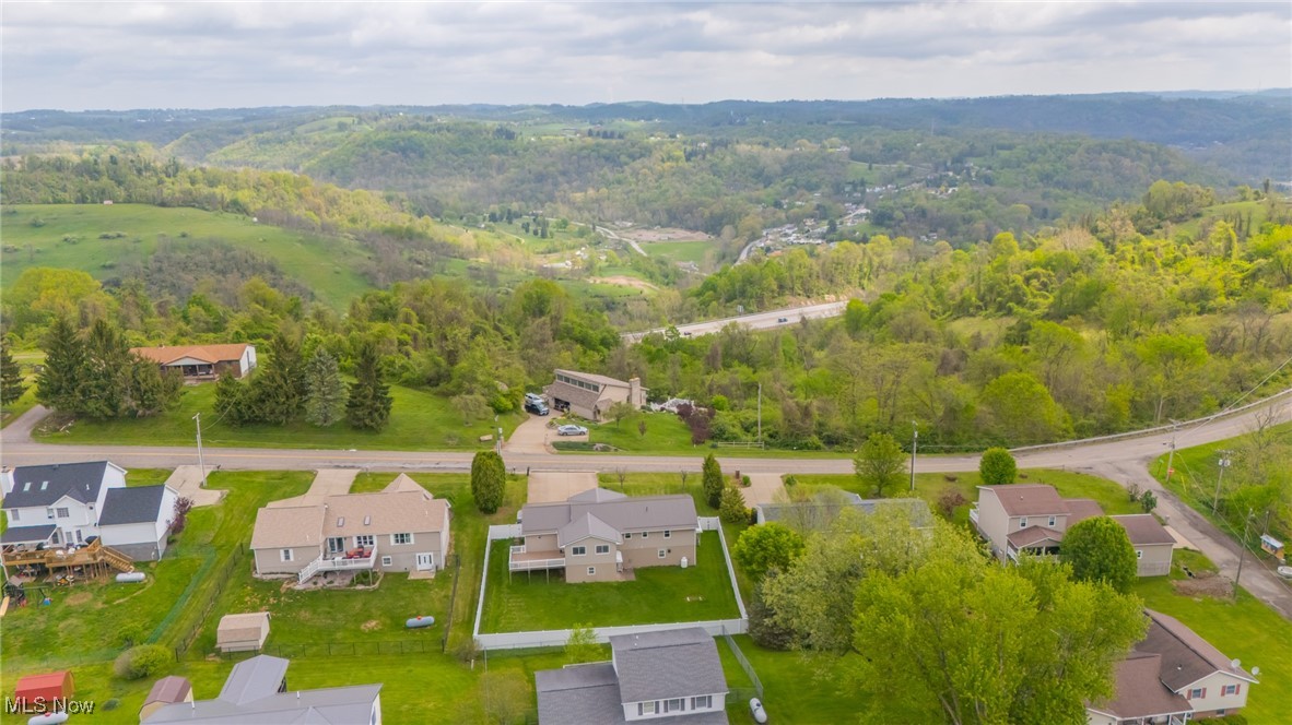 53350 High Ridge Road Bridgeport, OH 43912 - Photo 35 of 37 Aerial view featuring a wooded view and a residential view
