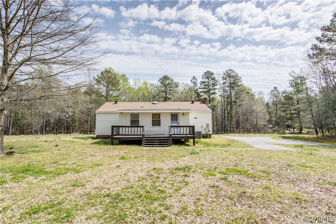11610 Buckhorn Road Chesterfield, VA 23838 - Photo 2 of 37 a house with trees in the background