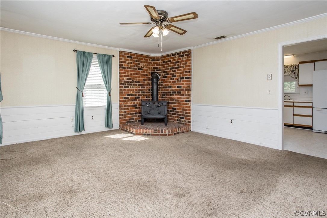 11610 Buckhorn Road Chesterfield, VA 23838 - Photo 3 of 37 an empty room with chandelier fan and windows