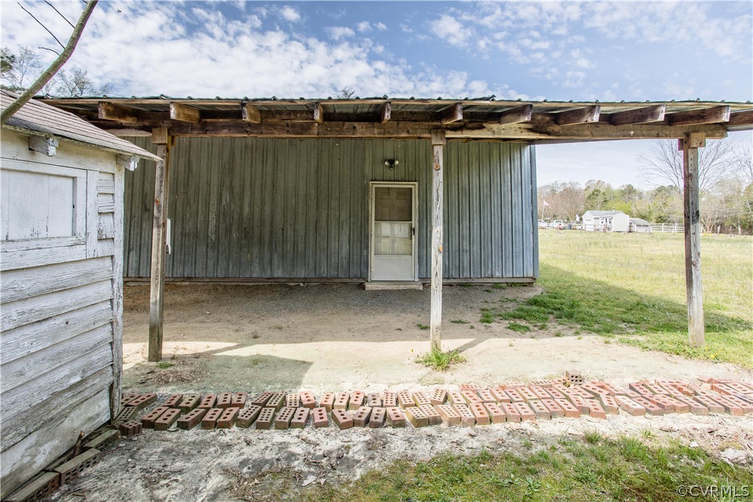 11610 Buckhorn Road Chesterfield, VA 23838 - Photo 32 of 37 a view of a house with a backyard