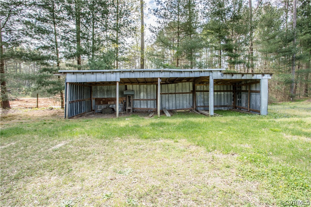 11610 Buckhorn Road Chesterfield, VA 23838 - Photo 33 of 37 a view of a house with a backyard and a tree