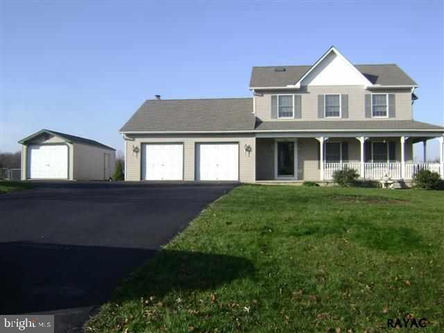 5200 Geeting Road Westminster, MD 21158 - Photo 1 of 6 a front view of a house with a yard
