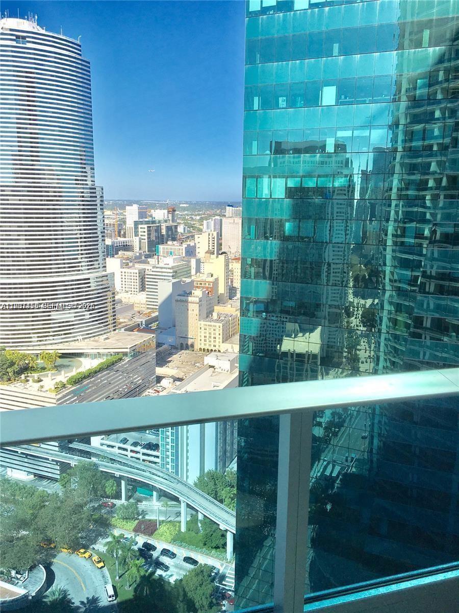200 Biscayne Blvd Way, Unit 3712 Miami, FL 33131 - Photo 2 of 18 a view of swimming pool from a balcony