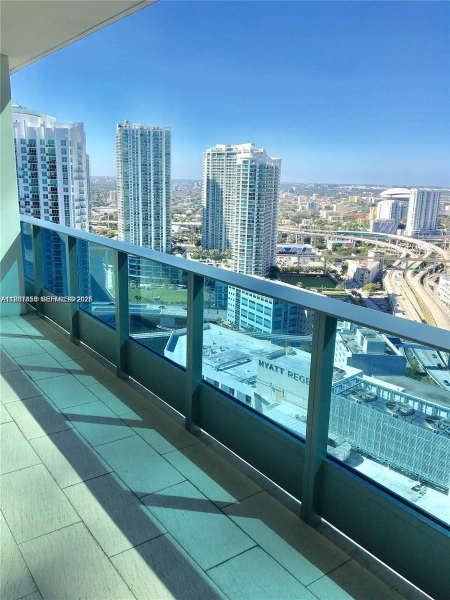 200 Biscayne Blvd Way, Unit 3712 Miami, FL 33131 - Photo 6 of 18 a city view from a balcony