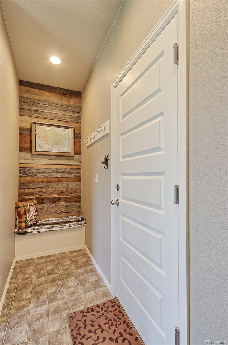 8376 Brandywine Avenue Frederick, CO 80504 - Photo 13 of 31 a view of storage and utility room