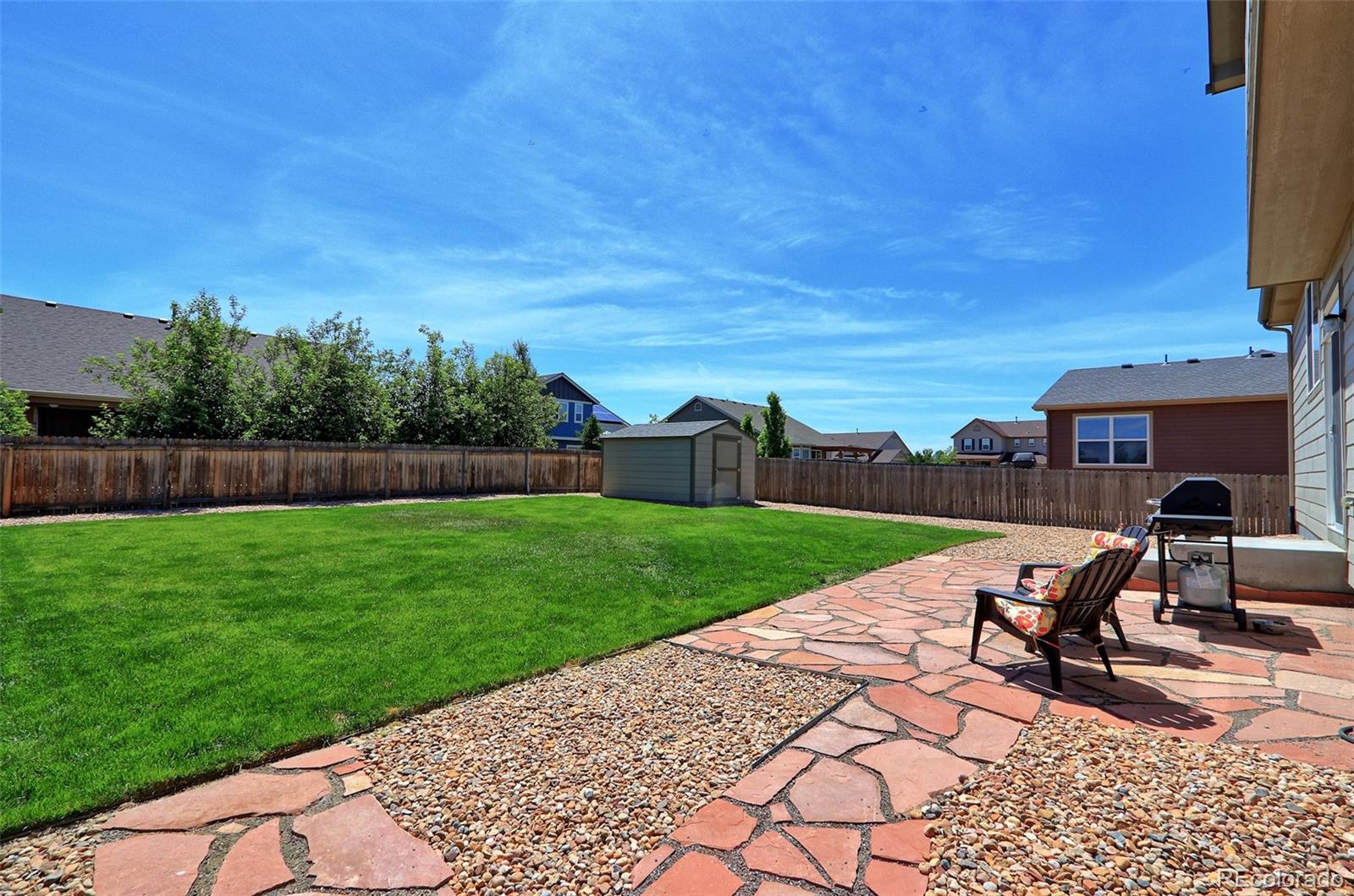8376 Brandywine Avenue Frederick, CO 80504 - Photo 29 of 31 a view of a garden with a slide