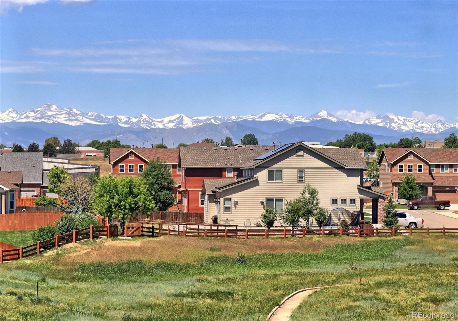 8376 Brandywine Avenue Frederick, CO 80504 - Photo 3 of 31 a view of a house with a big yard