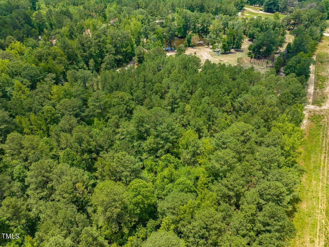 0 J B Morgan Road Apex, NC 27523 - Photo 24 of 39 an aerial view of residential house with outdoor space and trees all around